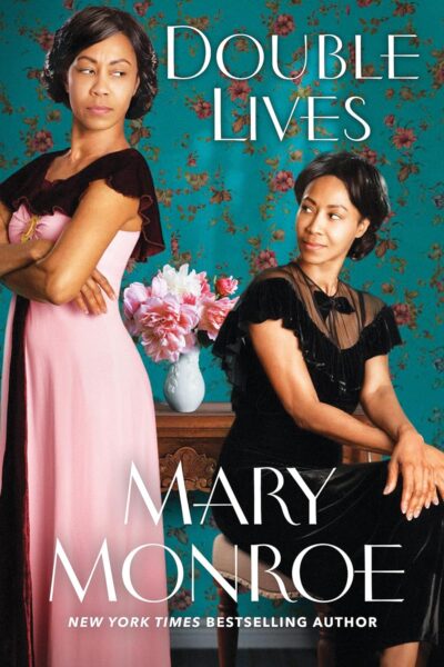 The cover of Double Lives is a photographic image of two young African American women. One is standing with her arms crossed. The other is sitting in a chair.